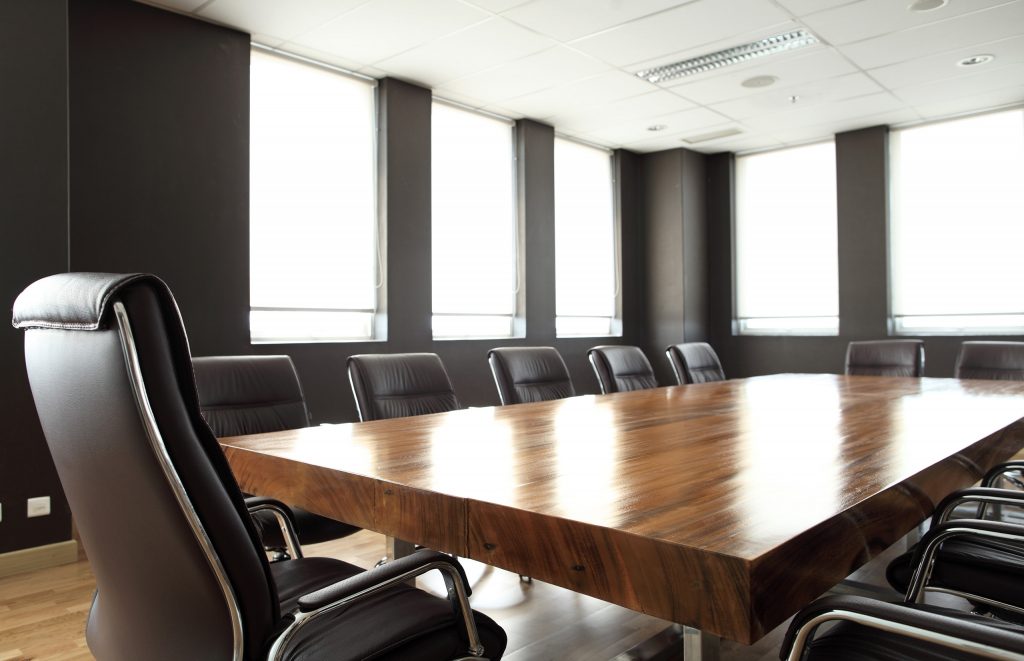 AdobeStock_65396910_office-meeting-table-1-1024x661